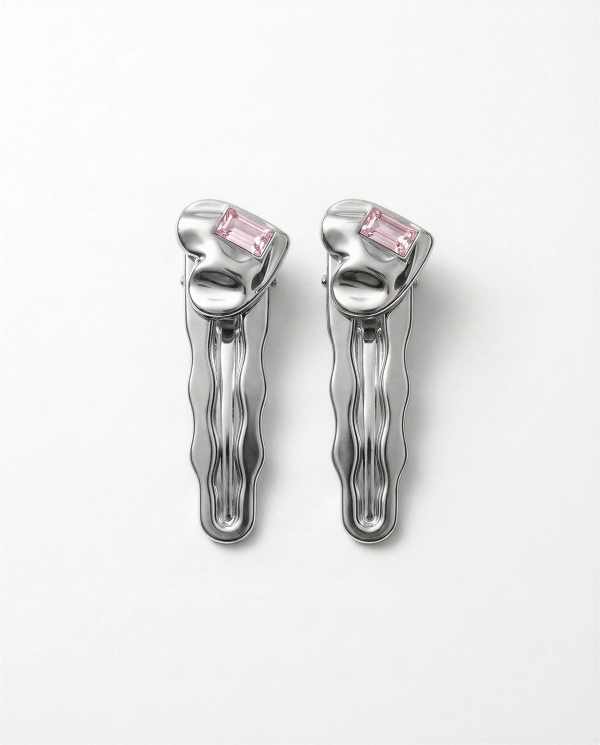 Les deux barrettes Silver Heart Duo sur fond blanc